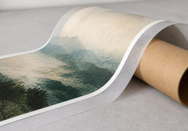 Fine art print with translucent protective tissue loosely reverse-rolled around an archival cardboard tube, artwork facing outward.