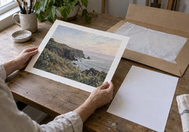 Artist reviewing one finished print, its product specifications, and packaging before automating fulfillment