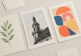 Three distinct custom art prints on fine art and photo papers on a studio table