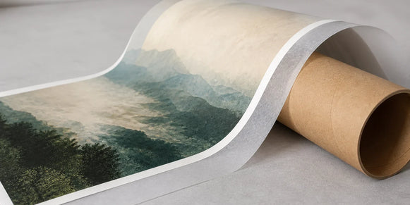 Fine art print with translucent protective tissue loosely reverse-rolled around an archival cardboard tube, artwork facing outward.