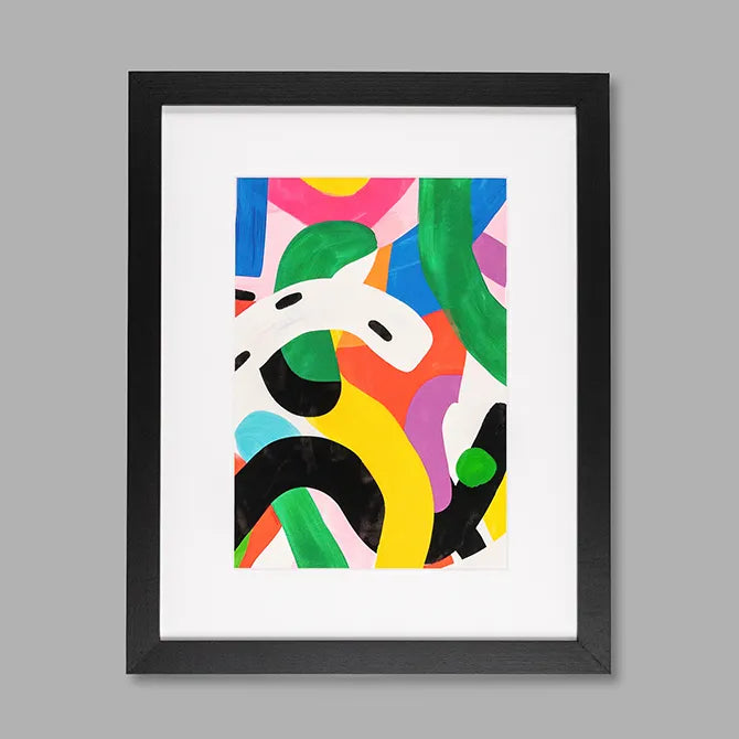 Black framed print with colorful abstract artwork and a white mat